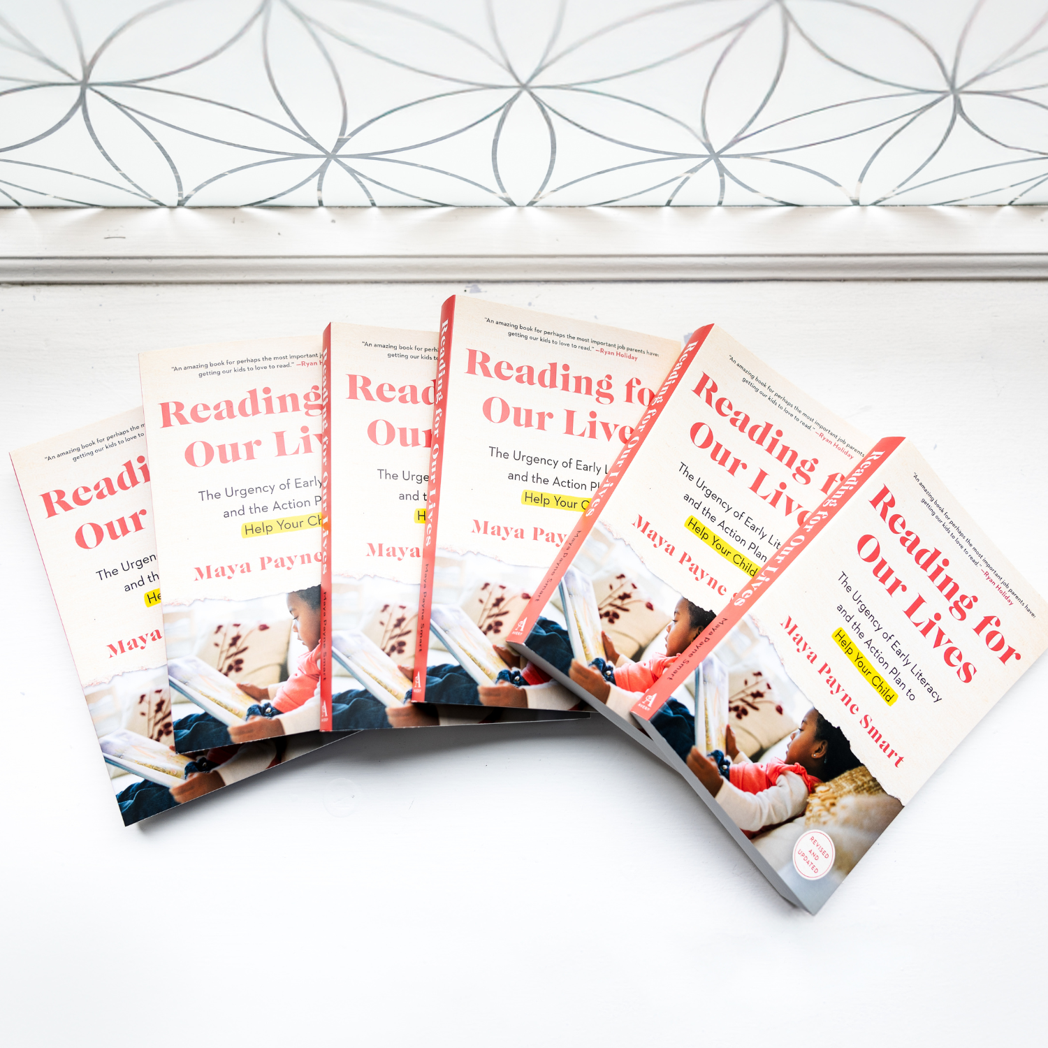 A stack of Maya's book, Reading for Our Lives